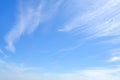 White feather clouds in bright azure sky as background Royalty Free Stock Photo