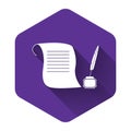 White Feather in the inkwell and paper scroll icon isolated with long shadow. Purple hexagon button Royalty Free Stock Photo