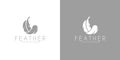 White feather. Black feather. Logo Royalty Free Stock Photo