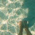 White feet relaxing his toes on the white sand of a beach Royalty Free Stock Photo