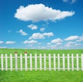 White fence with and blue sky Royalty Free Stock Photo