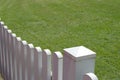 White fence and green grass of home Royalty Free Stock Photo