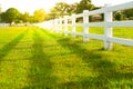 White Fence with trees Royalty Free Stock Photo