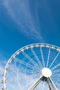 White ferris wheel against blue background Royalty Free Stock Photo