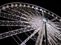 White Ferris Wheel over dark night sky Royalty Free Stock Photo