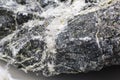 White fibers of asbestos mineral in stone Royalty Free Stock Photo