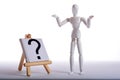 White figure is standing in front of a question mark Royalty Free Stock Photo