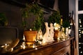 White figurines of children singing Christmas songs on the piano. New Year