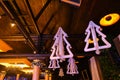 White fir tree decorations for Christmas on ceiling.