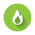 White Fire flame icon isolated with long shadow. Green circle button. Vector Royalty Free Stock Photo
