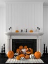White fireplace decorated with pumpkins for Halloween