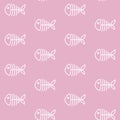 White fish skeleton on a pink background marine sea bone pattern