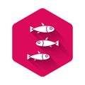 White Fishes icon isolated with long shadow. Pink hexagon button. Vector.