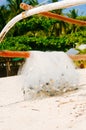 White fishing nets in the blue boat on the beach Royalty Free Stock Photo