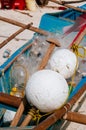 White fishing nets in the blue boat on the beach Royalty Free Stock Photo