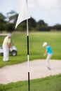 White flag at golf course Royalty Free Stock Photo