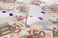 White flag sticking in 50 Euro banknotes.(series)