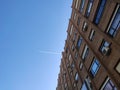 The white flash of the plane appearing through the building causing the lines to be cut, in Madrid