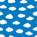 White flat clouds on the blue sky. Seamless vector pattern.