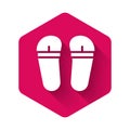 White Flip flops icon isolated with long shadow background. Beach slippers sign. Pink hexagon button. Vector Royalty Free Stock Photo