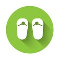 White Flip flops icon isolated with long shadow. Beach slippers sign. Green circle button. Vector Royalty Free Stock Photo