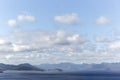 White Floating High Above Blue Surface Lake In Lake Gordon Tasmania Royalty Free Stock Photo