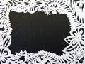 White floral frame. Paper cutting. Royalty Free Stock Photo