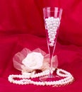 White flower, pearls and beads Royalty Free Stock Photo