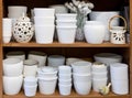 White flowerpots in the florist store Royalty Free Stock Photo