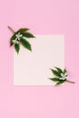 White flowers and pink sheet on pinj background.