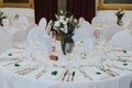 white flowers are placed on the tables in this banquet setting Royalty Free Stock Photo