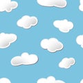 White fluffy cartoon clouds seamless pattern on light blue sky background. Vector EPS 10 illustration for kids fabric or backdrop Royalty Free Stock Photo
