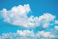 White fluffy cloud on blue sky. Cloudscape photo background. Optimistic skyscape with fluffy cloud Royalty Free Stock Photo