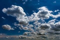 White fluffy clouds against a blue sky