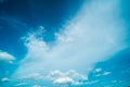 White fluffy clouds against blue sky in summer nature season weather background Royalty Free Stock Photo