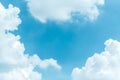 White fluffy clouds against blue sky in summer nature season weather background Royalty Free Stock Photo