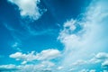 White fluffy clouds against blue sky in summer nature season weather background Royalty Free Stock Photo