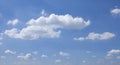 White fluffy clouds and blue sky