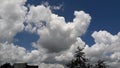 White fluffy clouds and blue sky