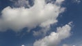 White fluffy clouds and blue sky