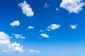 White fluffy clouds in the blue sky at caribbean ocean Royalty Free Stock Photo