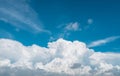 White fluffy clouds on blue sky. Soft touch feeling like cotton. White puffy clouds cape with space for text. Beauty in nature. Royalty Free Stock Photo