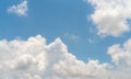 White fluffy clouds on blue sky. Soft touch feeling like cotton. White puffy cloudscape. Beauty in nature. Close-up white cumulus Royalty Free Stock Photo