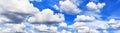 White fluffy clouds clear blue sky background panorama, cumulus cloud texture, cloudy azure skies backdrop, beautiful cloudscape Royalty Free Stock Photo