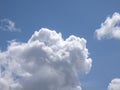White fluffy clouds in the deep blue sky background Royalty Free Stock Photo