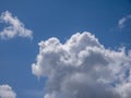 White fluffy clouds in the deep blue sky background Royalty Free Stock Photo