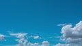 White fluffy clouds move horizontal in clear blues sky in bright sunny day, clouds skycaps background,Sky with clouds weather natu