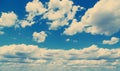 White fluffy clouds over blue sky. Royalty Free Stock Photo