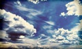 White fluffy clouds over blue sky, filtered image instagram effect. Royalty Free Stock Photo