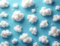 White fluffy cotton wool clouds pattern on light blue background. Soft puffy shapes create peaceful sky texture. Minimalist Royalty Free Stock Photo